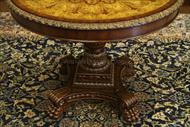 carved edging around the table is gold accents