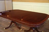 Duncan Phyfe style mahogany dining table