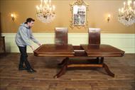 Mahogany dining table with self storing leaves