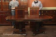 Mahogany dining table with 2 leaves or extensions