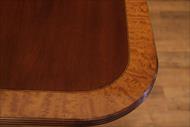 Heirloom mahogany dining table with satinwood banding