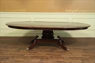 round mahogany dining table with leaves