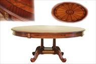 Round mahogany dining table