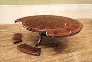 Large round mahogany dining table