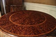 Antique reproduction round mahogany pedestal table