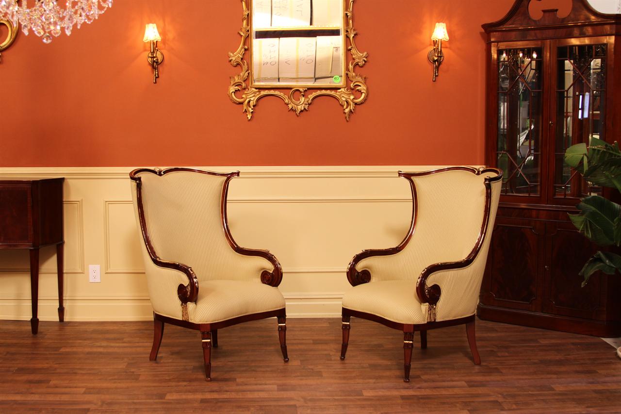 High end gold leaf accented fireside chairs