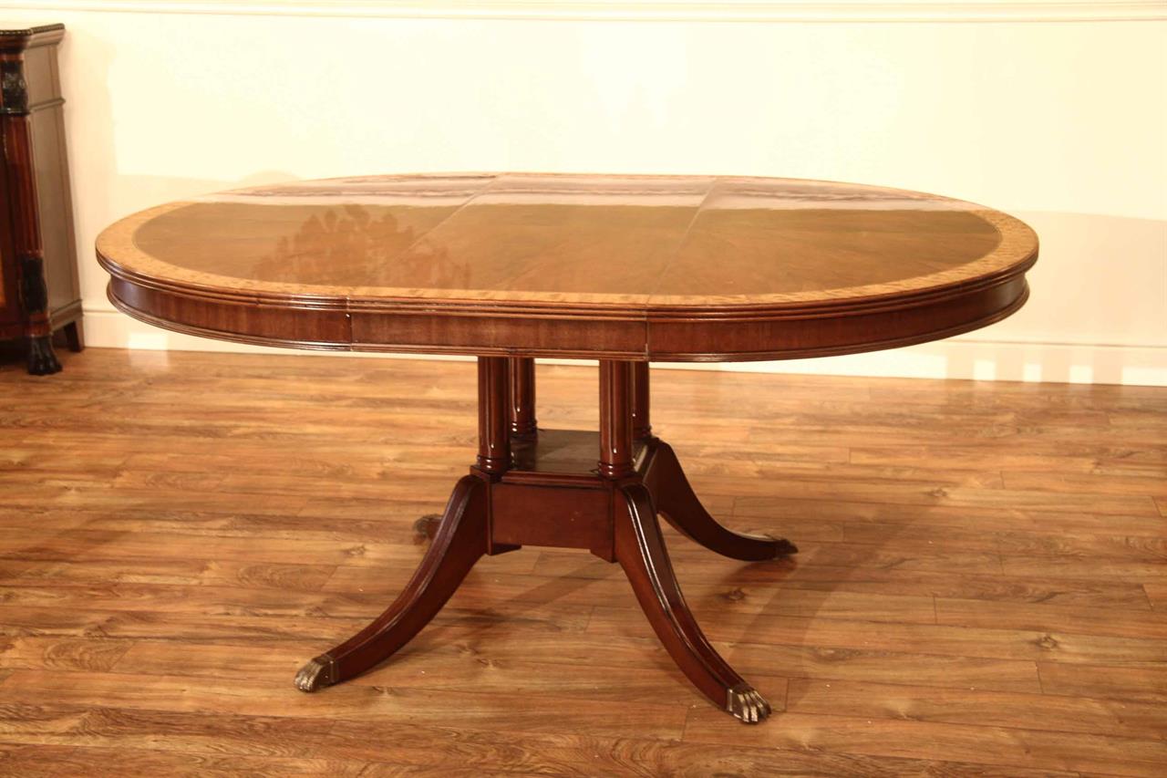 Small 48 in Round Mahogany Dining Table with Leaf