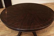 Dark wood round dining table