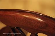 Crest details of distressed medium mahogany finish