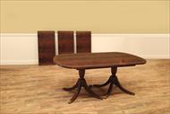Duncan Phyfe double pedestal dining room table with leaves seats 12 people