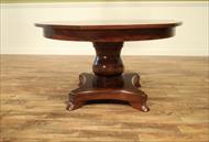 Mahogany jupe table with self storing leaves