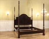 Four poster king bed showing all posters at full height