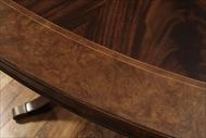 Burled walnut banded mahogany dining room table