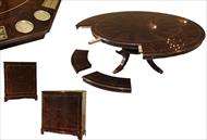 Large round mahogany dining room table with poker leaves