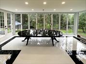 Round expandable dining room table