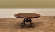 round mahogany pedestal table with leaves seats 6 to 12 people