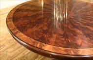 large round mahogany dining table