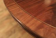 round inlaid mahogany dining table