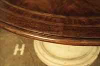 54 Round rustic table with large antiqued base.
