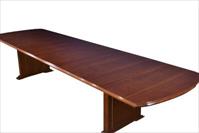 High end, expandable mahogany conference table seats 18-20 people.