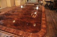 Mahogany dining table with blonde banding, reeded edge and mahogany apron