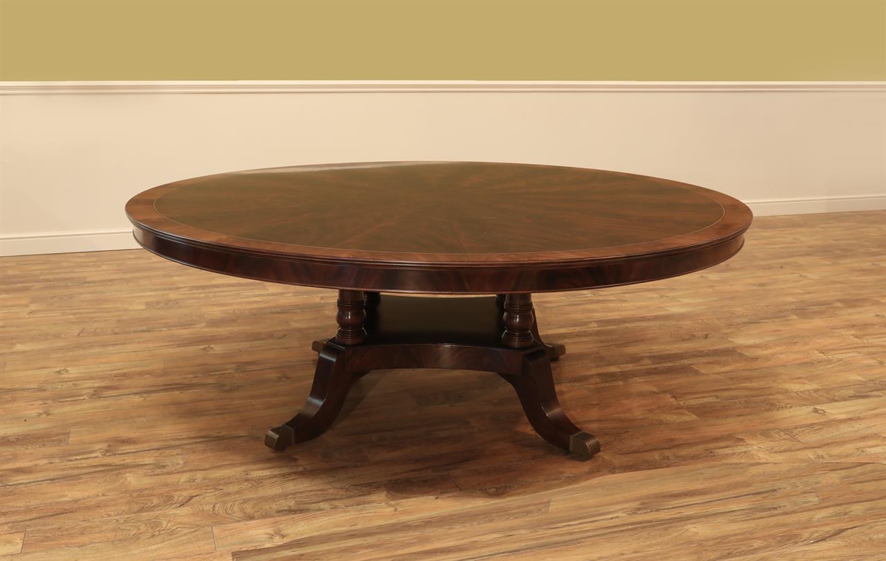 84 round dining table on classic birdcage pedestal and custom brass feet, extra large one-piece round table an AP Exclusive by AntiquePurveyor