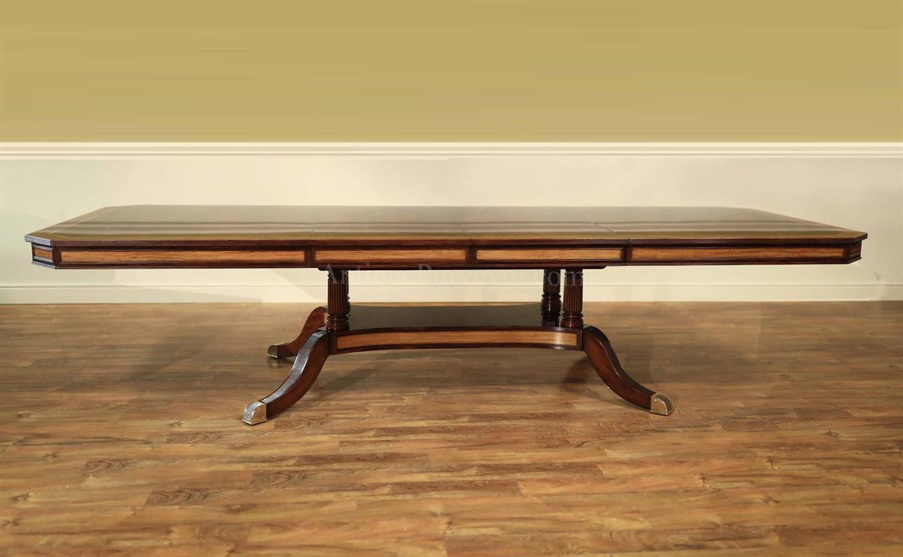 Extra large and wide mahogany dining table with self storing leaves and extra sturdy platform base.