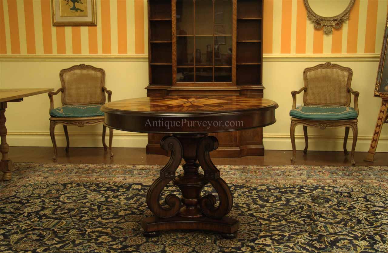Inlaid entrance way table with satinwood floral inlays.  Regency style pedestal base.