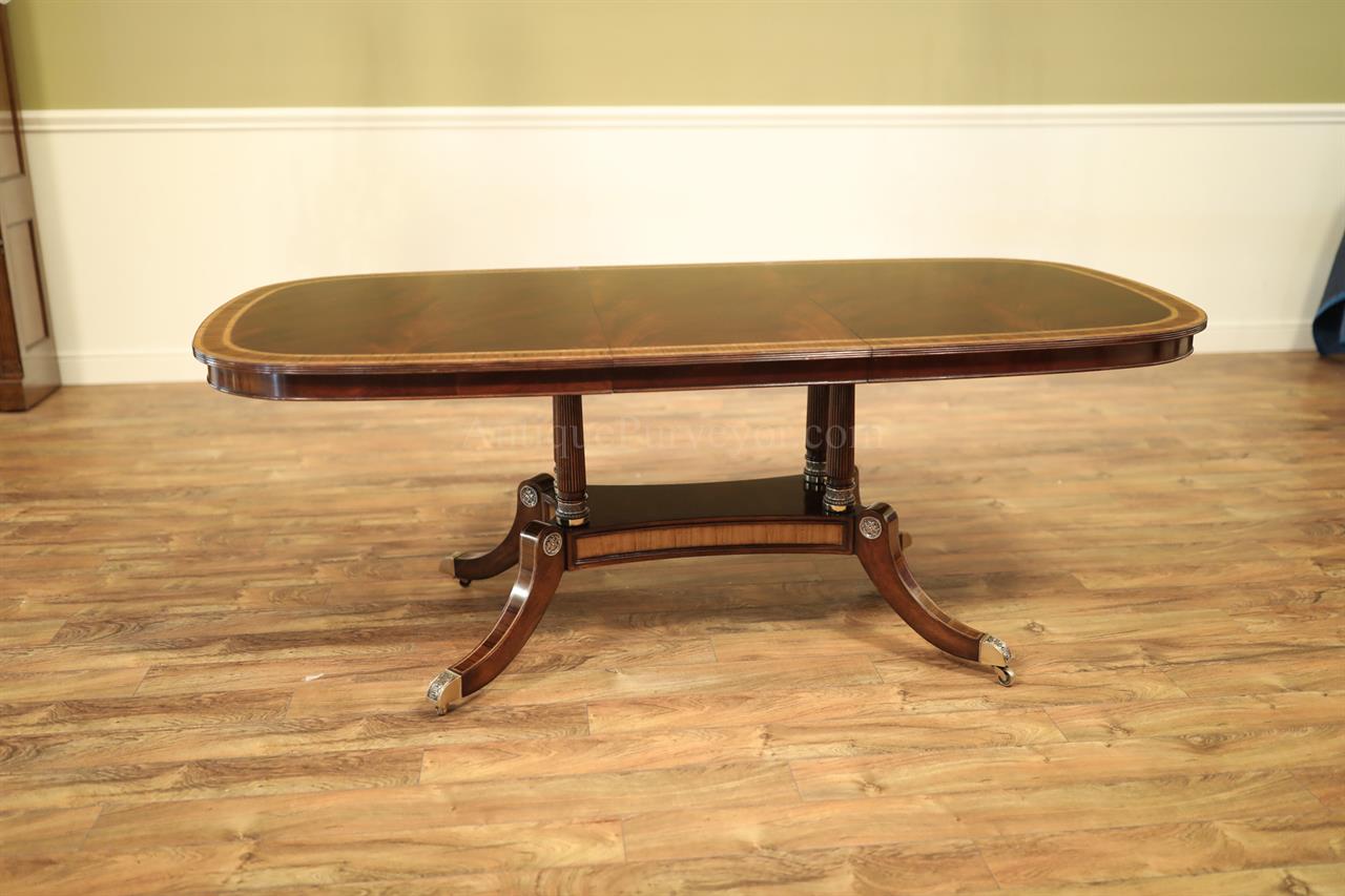 Small Inlaid Swirl Mahoagny Library or Dining Table With Self-Storing Leaf
