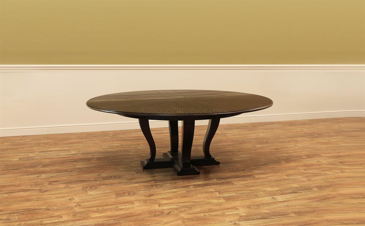 64 to 84 Round Transitional Ebonized Oak Jupe Table With Self-Storing Leaves Seats 6-10 People