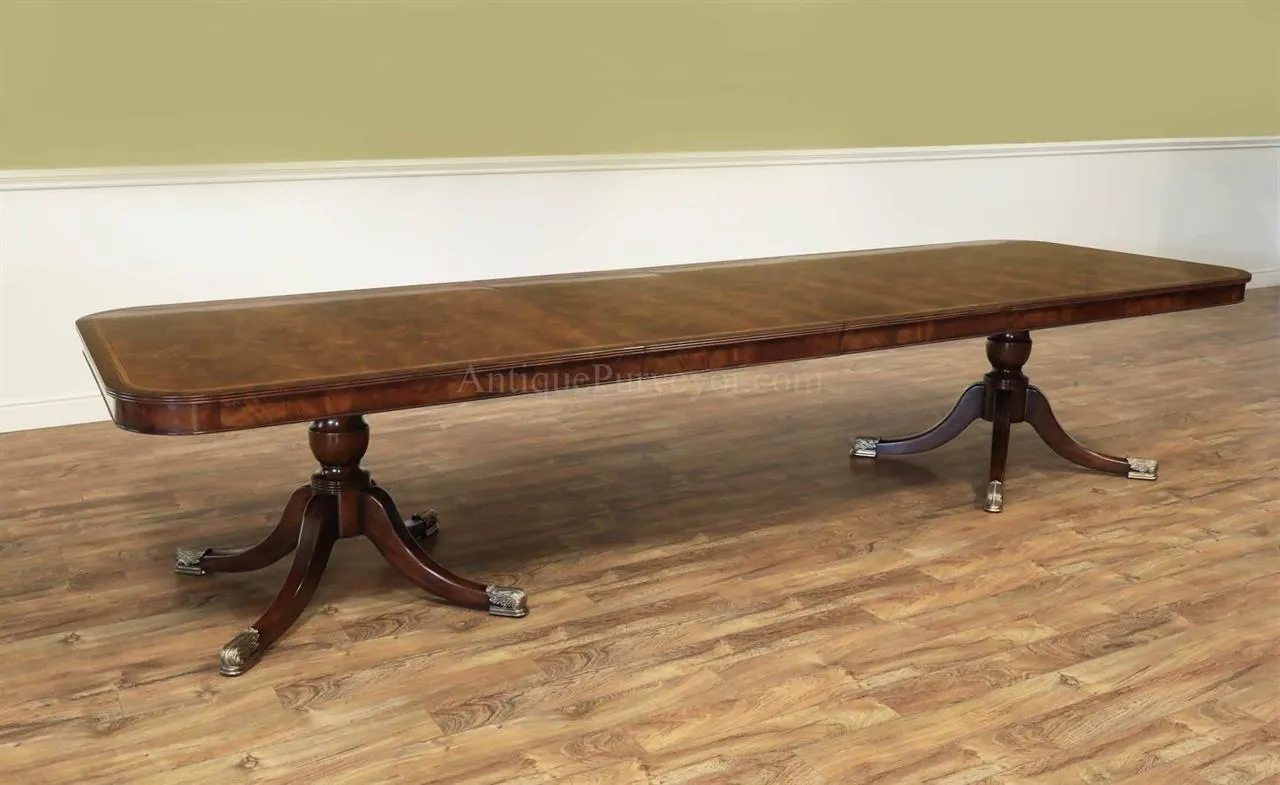 144 inch flame mahogany dining table with two 24" self storing leaves