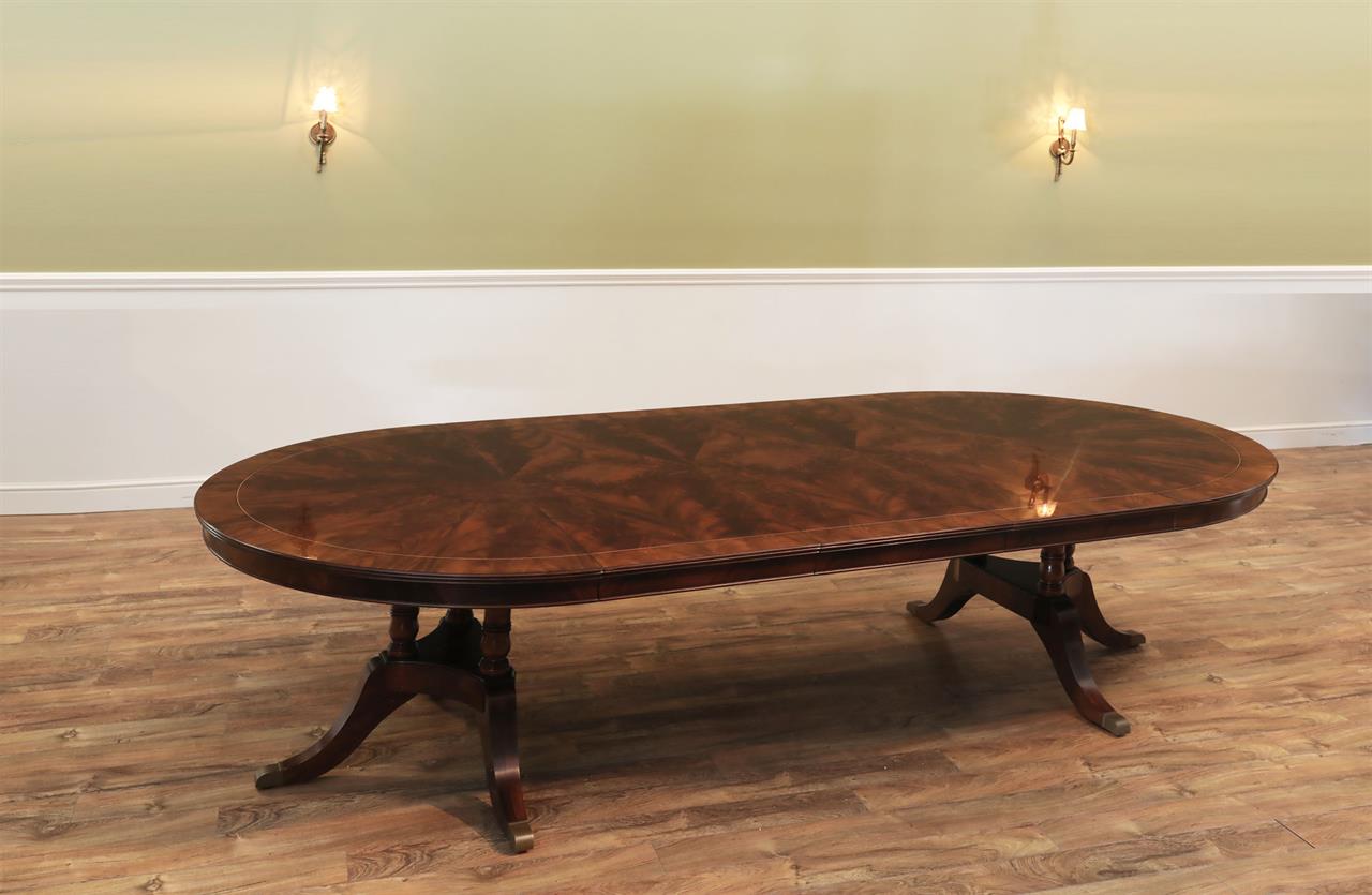 60 inch Round Mahogany Dining Table Opens to 10 feet and seats 12 an AP Exclusive by AntiquePurveyor