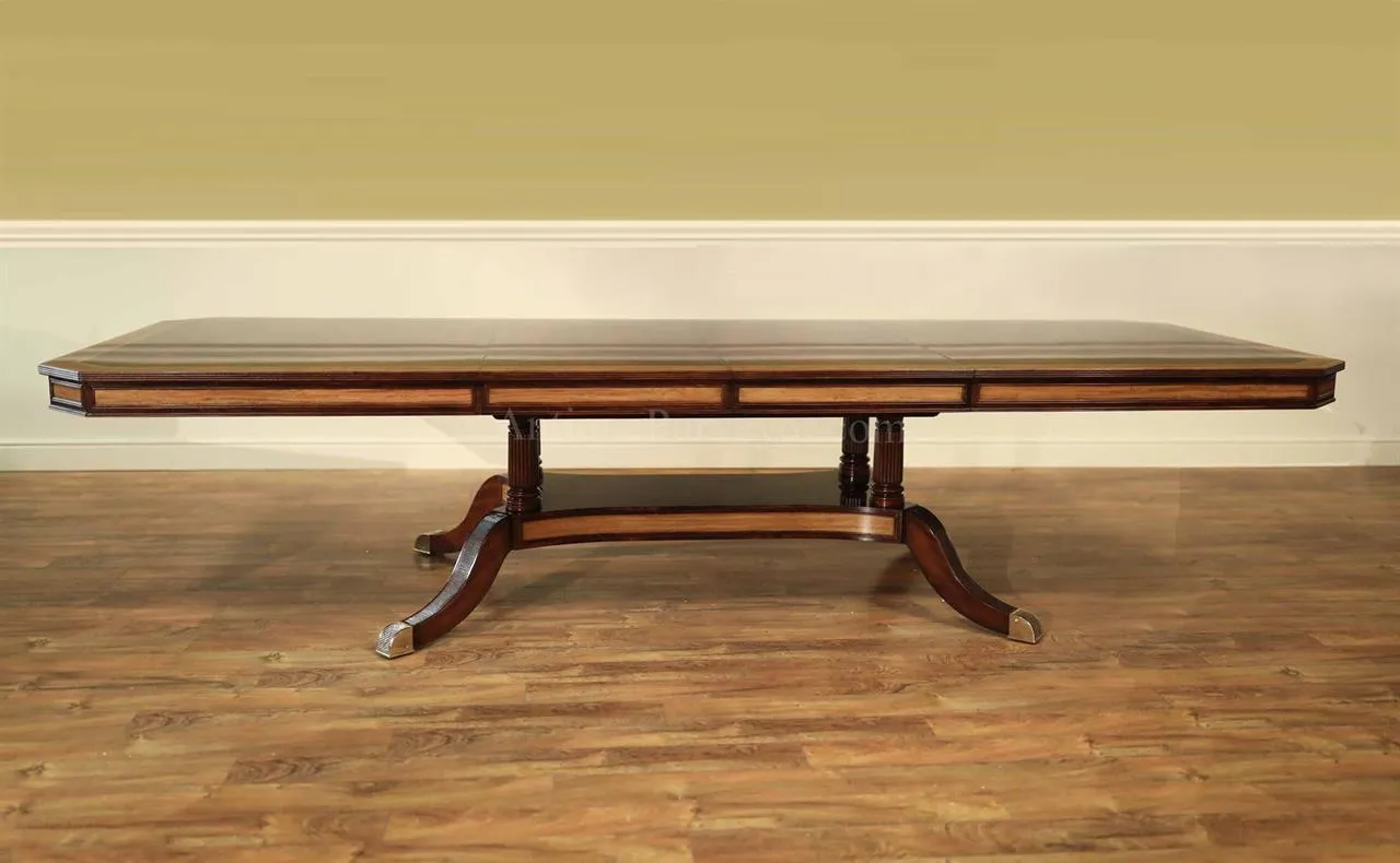 Extra large and wide mahogany dining table with self storing leaves and extra sturdy platform base.