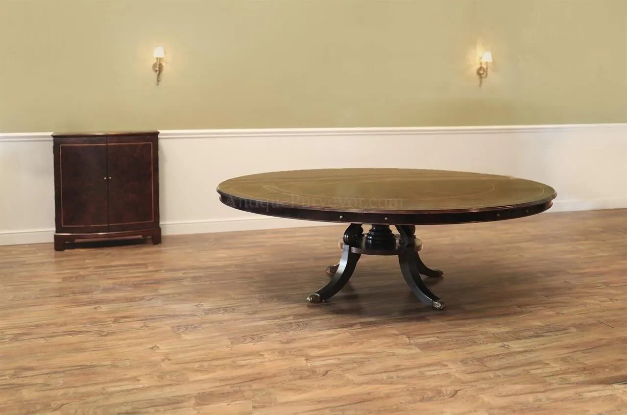 Large round expandable mahogany dining table with matching leaf storage cabinet in our extra dark finish. an AP Exclusive by AntiquePurveyor