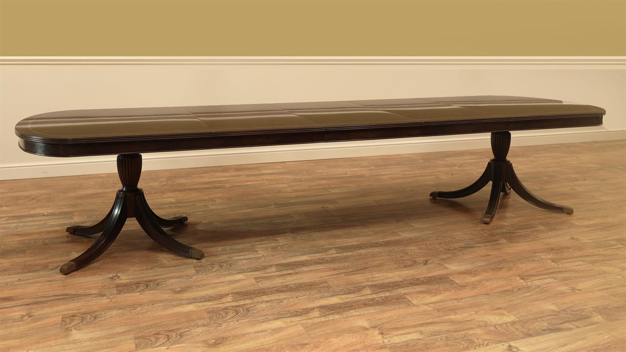 Dark mahogany dining table for seating 8 to 14 people. SPECIAL long-grain mahogany table an AP Exclusive by AntiquePurveyor