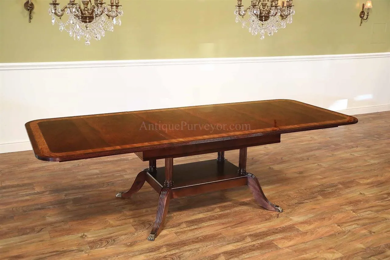 Custom narrow mahogany dining table with self storing leaves. Size, finish and inlays can be modified