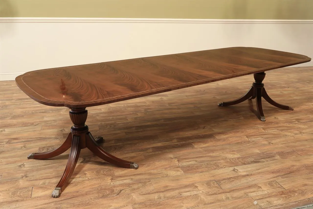 Duncan Phyfe double pedestal scallop corner dining room table seats 12 people.