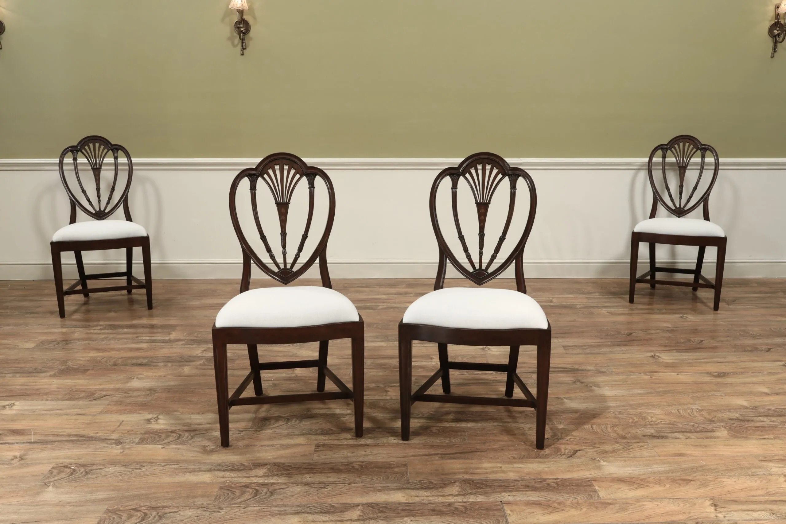 High end inlaid Hepplewhite chairs. Antique style dining chairs in solid mahogany and inlaid bell flowers