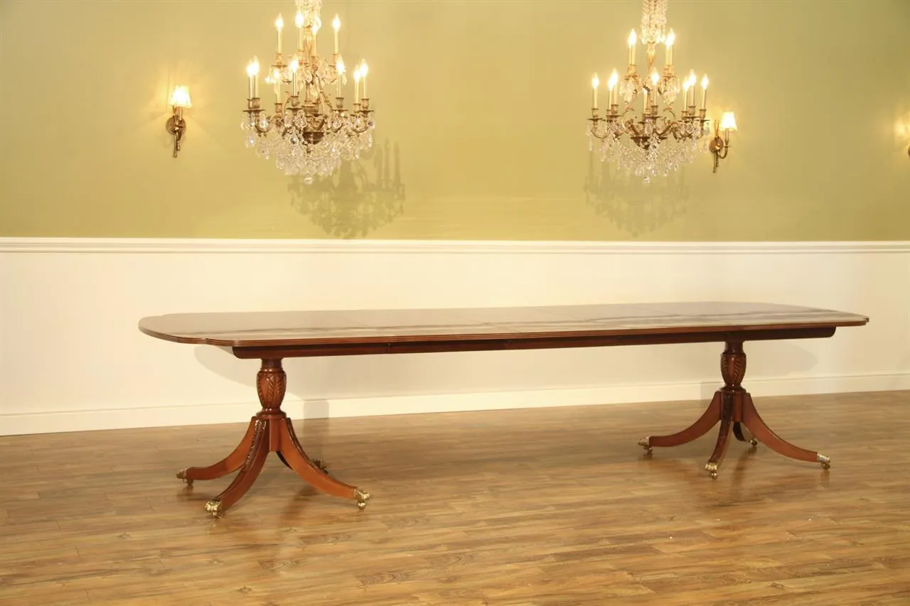 American made mahogany dining table opens to 140 inches and seats 14 people. New heirloom quality mahogany dining table with custom finish