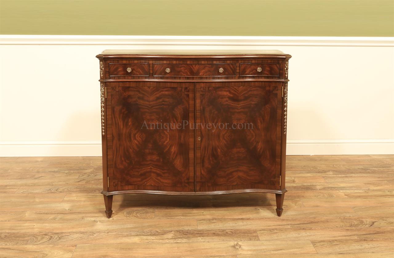 Mahogany buffet or small serpentine 2 door side cabinet