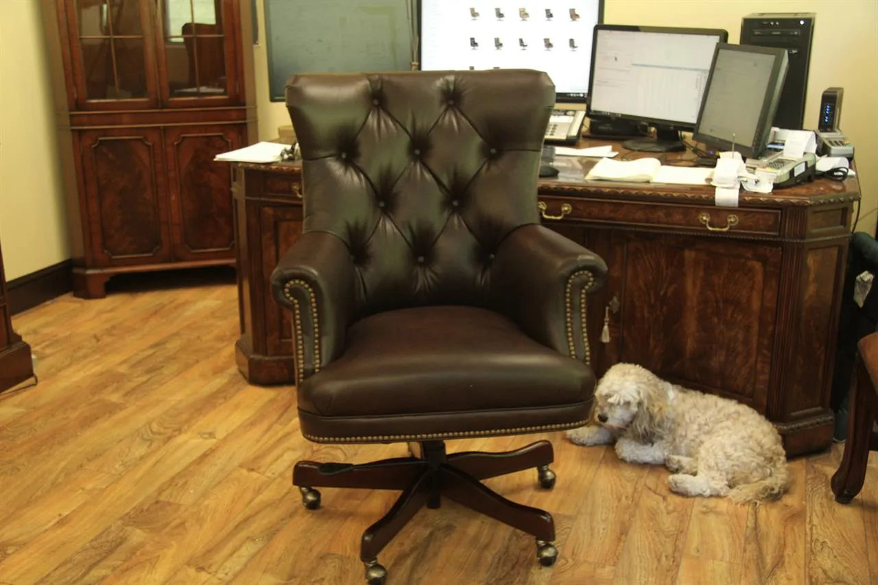 Tufted leather executive chair with swivel tilt