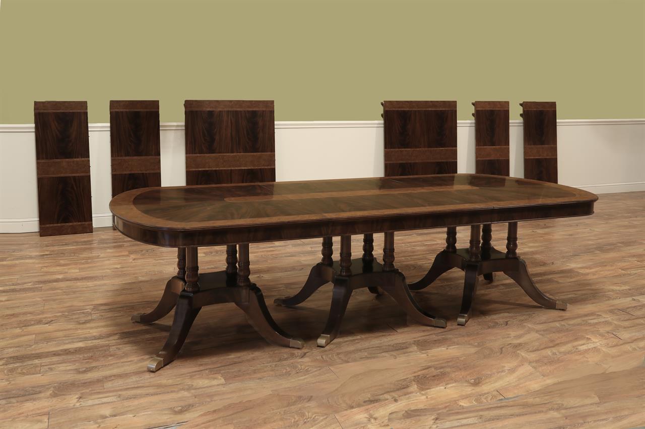 Sunburst Inlaid Mahogany Dining Table with Flame Mahogany Birdcage Pedestals and Brass Capped Feet