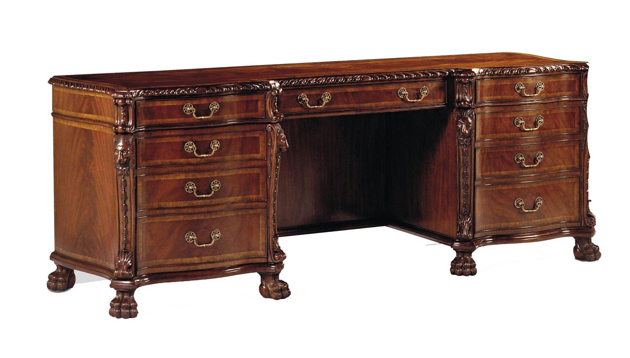 Fine reproduction mahogany executive desk.