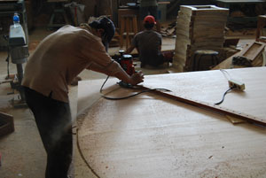 Indonesian mahogany furniture being manufactured, 60 round dining table with perimeter leaves.