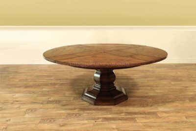 59 to 74 inch round to round county style table with factory distressing and hidden leaves. Round pedestal dining table or kitchen table.