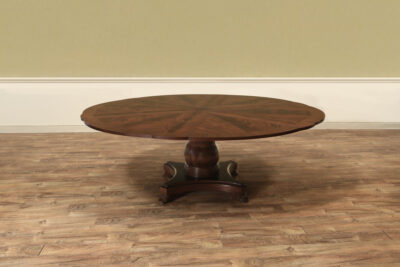 Mahogany Jupe table.  64 inch round to round solid dining table with brown mahogany finish. an AP Exclusive by AntiquePurveyor