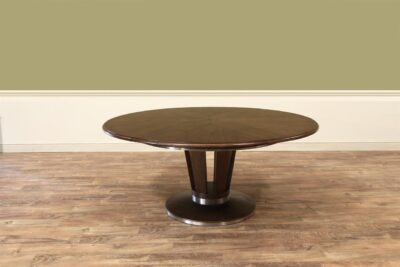 Medium 55 to 70 inch round to round Jupe dining table with antiqued stainless trim