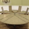 Modern or transitional Jupe table.  82 to 100 inch round to round expanding dining table with self-storing leaves seats 12 - Image 13