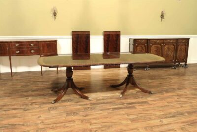 12 Foot Inlaid Mahogany Dining Table With Leaves. Brown Mahogany Finish With Dark Satinwood Banding.