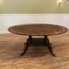 72-Round mahogany dining table. American-made Duncan Phyfe Pedestal Table
